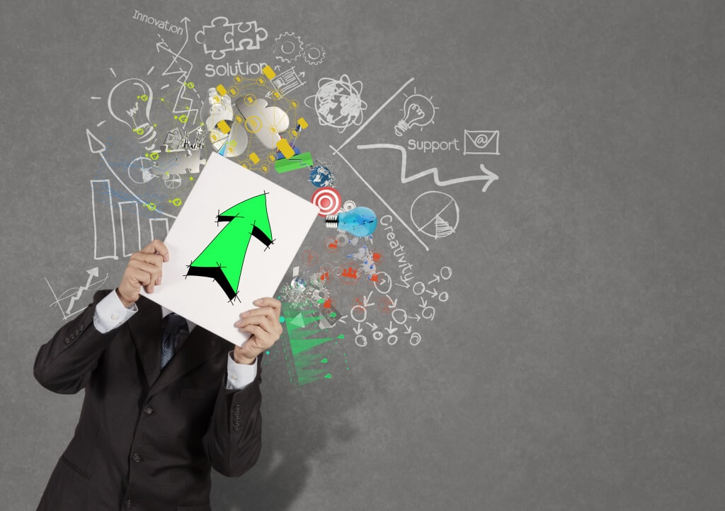 businessman holding book with green up arrow sign on business strategy background as concept