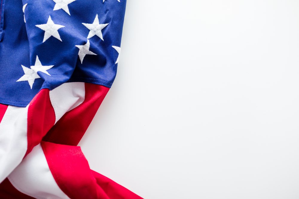 Tight closeup of the stars and stripes of an American Flag.